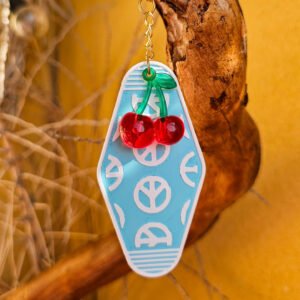 porte clés bleu clair et blanc peace